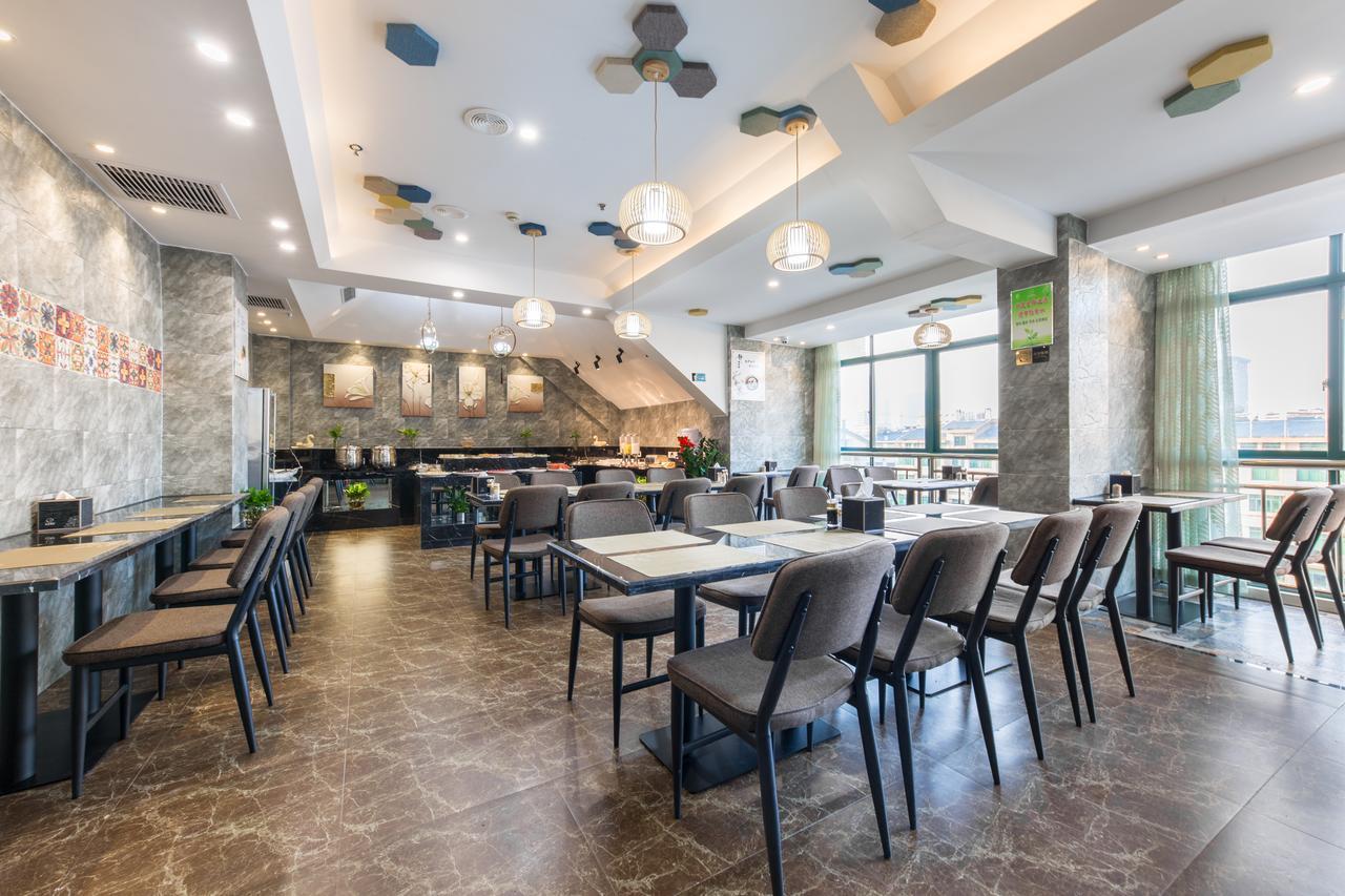 Yiwu Quan Ji Hotel Иу Екстериор снимка