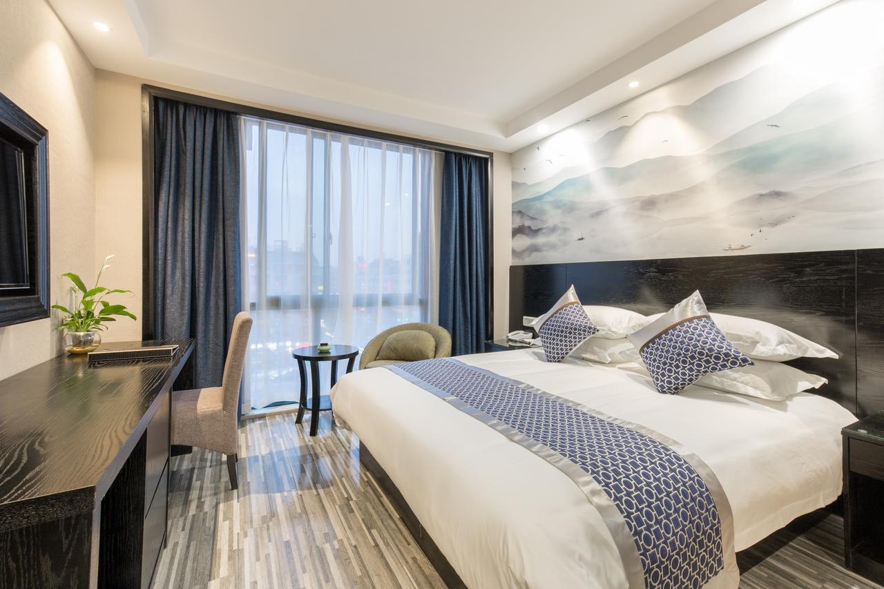 Yiwu Quan Ji Hotel Иу Екстериор снимка