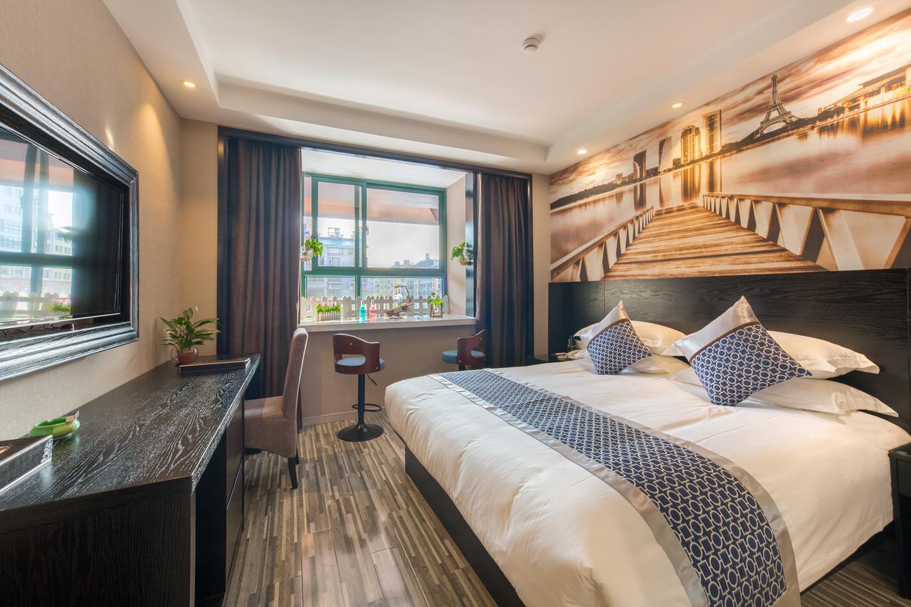 Yiwu Quan Ji Hotel Иу Екстериор снимка