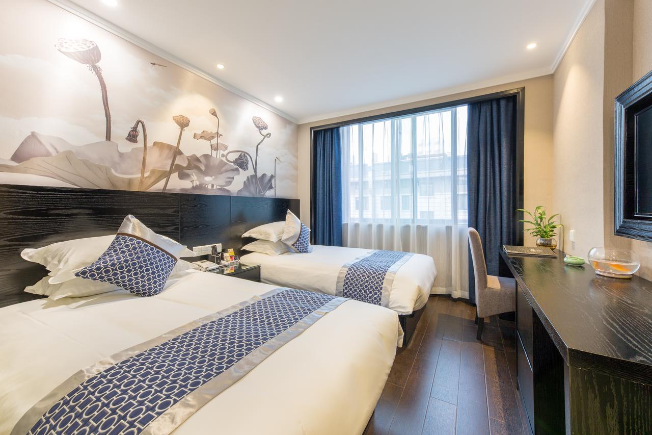 Yiwu Quan Ji Hotel Иу Екстериор снимка