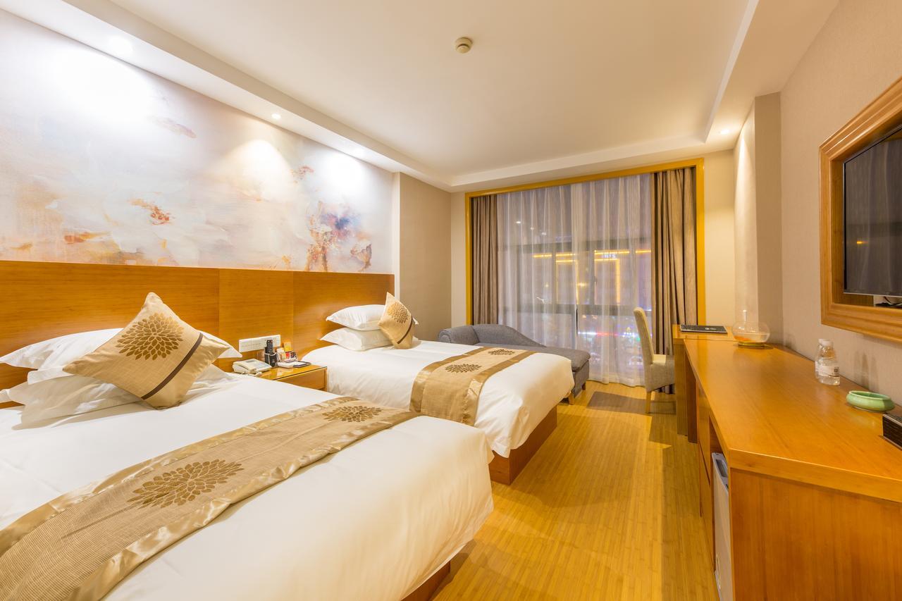 Yiwu Quan Ji Hotel Иу Екстериор снимка