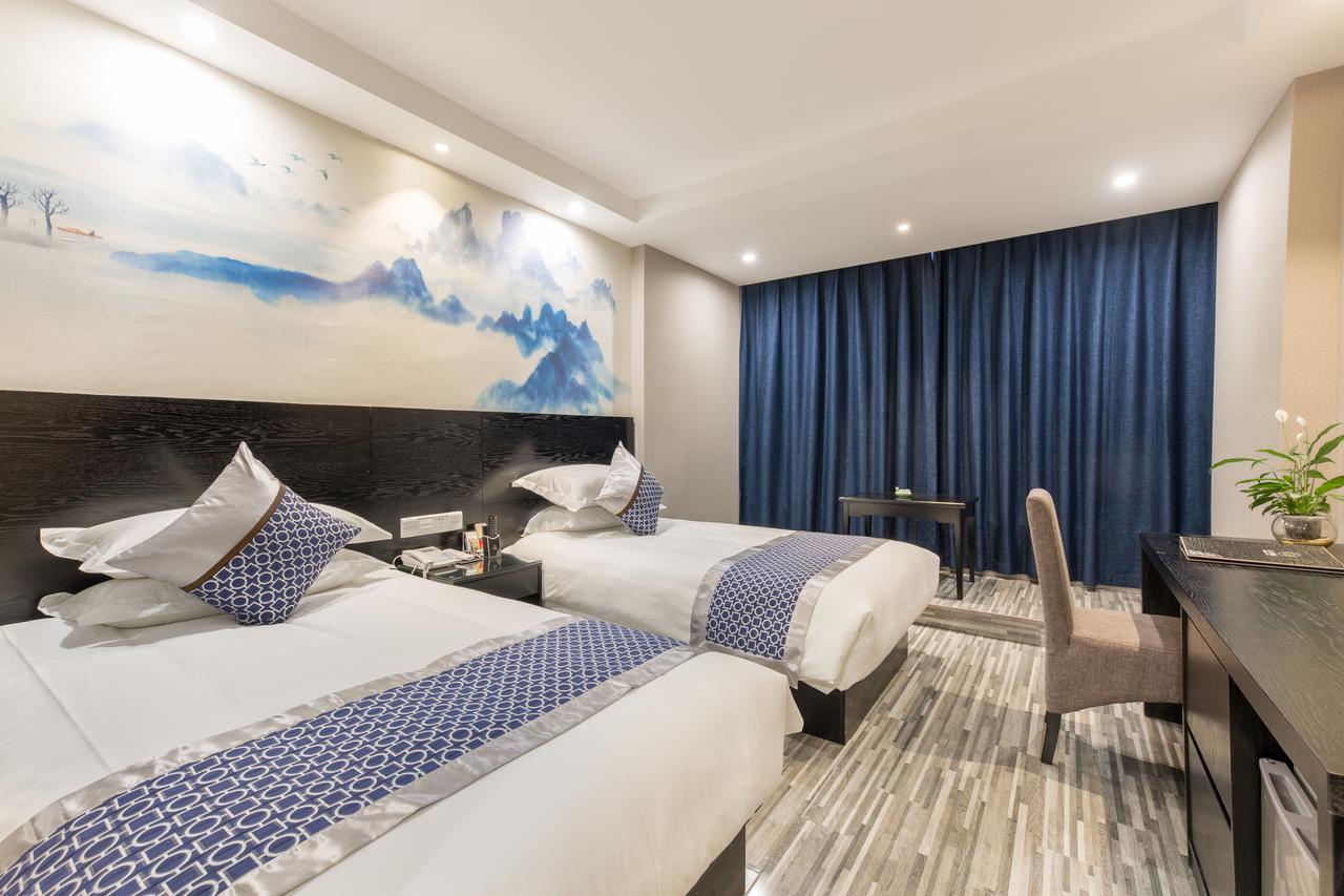 Yiwu Quan Ji Hotel Иу Екстериор снимка